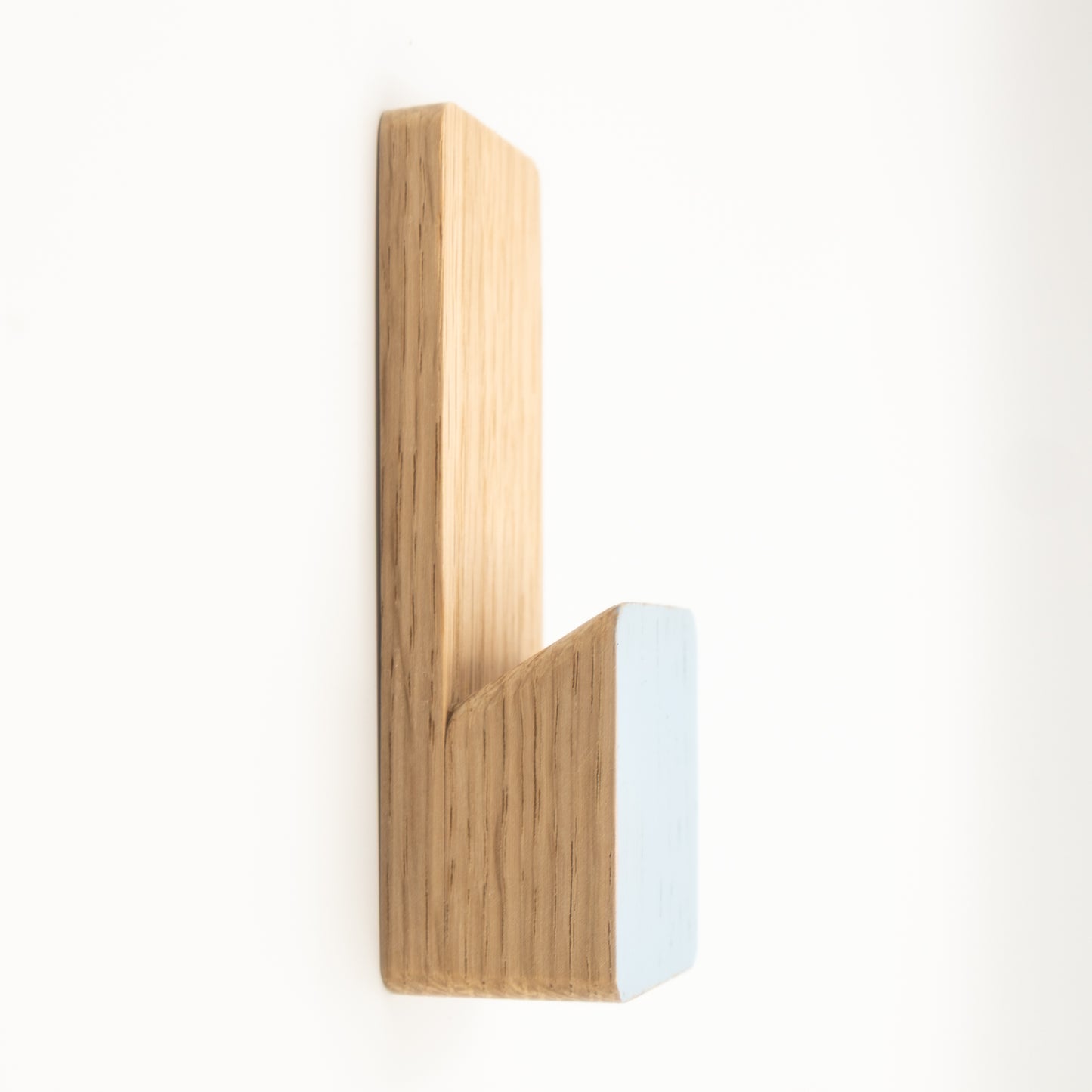 Adhesive Wooden wall hook on a white background
